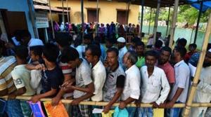 People wait in queue to check their names on the draft list at the National Register of Citizens (NRC) centre at a village in Nagaon district, Assam state, India, July 30, 2018.(Reuters file photo)