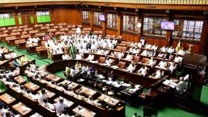 Congress MLAs shout slogans and demand to adjourned the assembly session for the day at Vidhana Soudha in Bengaluru.(Photo: PTI) Congress MLAs shout slogans and demand to adjourned the assembly session for the day at Vidhana Soudha in Bengaluru.(Photo: PTI)