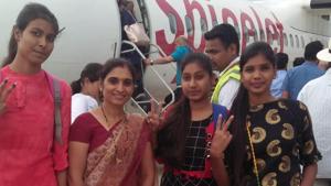The three girls from Government Girls Senior Secondary School in Arnod in Rajasthan’s Pratapgarh district with their principal just before their first flight/(HT PHOTO) The three girls from Government Girls Senior Secondary School in Arnod in Rajasthan’s Pratapgarh district with their principal just before their first flight/(HT PHOTO)