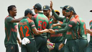 File image of players of Bangladesh cricket team celebrating after the fall of a wicket.(AFP)