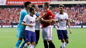 Manchester United's Scott McTominay clashes with Tottenham Hotspur's Paulo Gazzaniga and Harry Kane.(REUTERS) Manchester United's Scott McTominay clashes with Tottenham Hotspur's Paulo Gazzaniga and Harry Kane.(REUTERS)