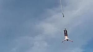 The rope snaps and the man is seen plummeting.(YouTube/Worldwide.Modern.Technology) The rope snaps and the man is seen plummeting.(YouTube/Worldwide.Modern.Technology)