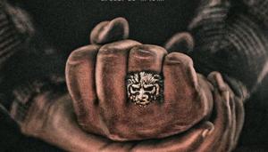 KGF Chapter 2 poster shows a dramatic ring with the face of a lion. KGF Chapter 2 poster shows a dramatic ring with the face of a lion.