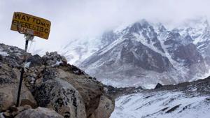 A sign shows the way to Everest Base Camp high in the Khumbu Glacier.(AFP File) A sign shows the way to Everest Base Camp high in the Khumbu Glacier.(AFP File)
