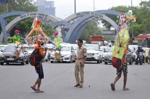 Noida, India - July 25, 2019: Uttar Pradesh police personnel assist and guide Kanwaryias during the Kanwar Yatra, in Noida, India, on Thursday, July 25, 2019. (Photo by Sunil Ghosh / Hindustan Times) Noida, India - July 25, 2019: Uttar Pradesh police personnel assist and guide Kanwaryias during the Kanwar Yatra, in Noida, India, on Thursday, July 25, 2019. (Photo by Sunil Ghosh / Hindustan Times)
