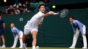 Novak Djokovic returns against Switzerland's Roger Federer during their men's singles final on day thirteen of the 2019 Wimbledon Championships at The All England Lawn Tennis Club in Wimbledon, southwest London, on July 14, 2019.(AFP) Novak Djokovic returns against Switzerland's Roger Federer during their men's singles final on day thirteen of the 2019 Wimbledon Championships at The All England Lawn Tennis Club in Wimbledon, southwest London, on July 14, 2019.(AFP)