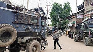 Army personnel in action during an encounter with terrorists in Jammu and Kashmir’s Shopian district on Saturday.(ANI Photo) Army personnel in action during an encounter with terrorists in Jammu and Kashmir’s Shopian district on Saturday.(ANI Photo)