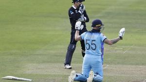 England's Ben Stokes holds up his hands apologetically after get a 6 from overthrows.(AP) England's Ben Stokes holds up his hands apologetically after get a 6 from overthrows.(AP)
