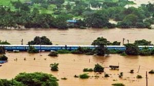 Mahalaxmi Express was first delayed when it reached Ambernath station, where the tracks were flooded, at 10pm on Friday.(HT Photo)