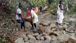 Villagers storing stones to make a boundary for rain water harvesting at Ara-Keram Village under Ormanjhi block in Ranchi on July 28, 2019.(Hindustan Times) Villagers storing stones to make a boundary for rain water harvesting at Ara-Keram Village under Ormanjhi block in Ranchi on July 28, 2019.(Hindustan Times)