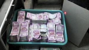 Pune: Cash recovered by Income Tax department from a bank locker in Pune on Wednesday. PTI Photo (PTI12_14_2016_000282B)(PTI file photo for representation) Pune: Cash recovered by Income Tax department from a bank locker in Pune on Wednesday. PTI Photo (PTI12_14_2016_000282B)(PTI file photo for representation)