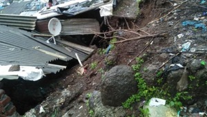 The deceased Birendra Jaswal, 40 and his son Sunny Jaswar, 10 were caught beneath the debris after the wall of their house collapsed due to the landslide.(HT Photo) The deceased Birendra Jaswal, 40 and his son Sunny Jaswar, 10 were caught beneath the debris after the wall of their house collapsed due to the landslide.(HT Photo)