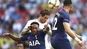 Real's Sergio Ramos, center, and Tottenham's Kyle Walter-Peters(AP) Real's Sergio Ramos, center, and Tottenham's Kyle Walter-Peters(AP)