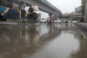 A waterlogged road at Majiwada junction at Kapurbawdi in Thane. A waterlogged road at Majiwada junction at Kapurbawdi in Thane.