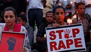 People participate in a candle light vigil as they protest against the rape of an eight-year-old girl in Kathua near Jammu, and a teenager in Unnao, Uttar Pradesh state, in Bengaluru, India.(Reuters) People participate in a candle light vigil as they protest against the rape of an eight-year-old girl in Kathua near Jammu, and a teenager in Unnao, Uttar Pradesh state, in Bengaluru, India.(Reuters)