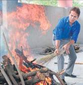 Neeraj Tamboliya cremates an unclaimed body in Jaipur. Neeraj Tamboliya cremates an unclaimed body in Jaipur.