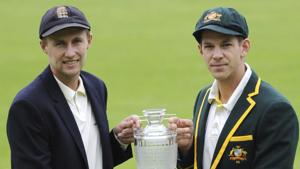 Australia's captain Tim Paine, right, and England captain Joe Root pose with the Waterford Crystal trophy before the first Ashes Test.(AP) Australia's captain Tim Paine, right, and England captain Joe Root pose with the Waterford Crystal trophy before the first Ashes Test.(AP)