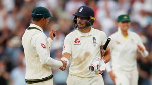 England's Rory Burns with Australia's Usman Khawaja at the end of play.(Reuters) England's Rory Burns with Australia's Usman Khawaja at the end of play.(Reuters)