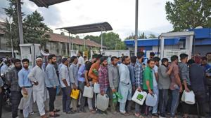 Srinagar, India-August 02, 2019: People stand in a queue at a petrol pump after an advisory was issued by the state’s home department for the Amarnath pilgrims and tourists in Kashmir, in Srinagar, Friday, August 2, 2019. The Jammu and Kashmir government on Friday asked Amarnath Yatris and tourists in Kashmir to “immediately” curtail their stay and leave the valley. The advisory, issued by the state’s home department, cited intelligence inputs about terror threats. (Photo by Waseem Andrabi/ Hindustan Times) Srinagar, India-August 02, 2019: People stand in a queue at a petrol pump after an advisory was issued by the state’s home department for the Amarnath pilgrims and tourists in Kashmir, in Srinagar, Friday, August 2, 2019. The Jammu and Kashmir government on Friday asked Amarnath Yatris and tourists in Kashmir to “immediately” curtail their stay and leave the valley. The advisory, issued by the state’s home department, cited intelligence inputs about terror threats. (Photo by Waseem Andrabi/ Hindustan Times)