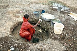 As water is supplied only once in 15 days here, only option left for villagers to fulfil their daily needs is a dried riverbed.(Sanjay Sadavarte/ HT photo) As water is supplied only once in 15 days here, only option left for villagers to fulfil their daily needs is a dried riverbed.(Sanjay Sadavarte/ HT photo)