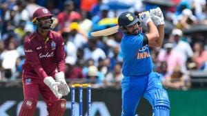 Rohit Sharma plays a shot against West Indies.(AFP) Rohit Sharma plays a shot against West Indies.(AFP)