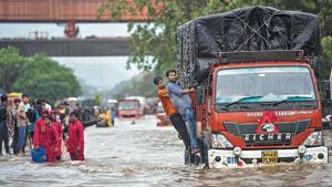 People walk from flooded road as there is water logging due to heavy rain on LBS Road near Sion station in Mumbai, on Sunday, August 4, 2019. (Photo by Pratik Chorge/Hindustan Times) People walk from flooded road as there is water logging due to heavy rain on LBS Road near Sion station in Mumbai, on Sunday, August 4, 2019. (Photo by Pratik Chorge/Hindustan Times)