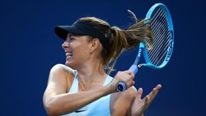aria Sharapova of Russia hits a shot against Anett Kontaveit.(AFP) aria Sharapova of Russia hits a shot against Anett Kontaveit.(AFP)