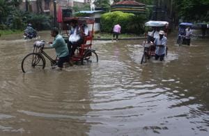 Heavy rain in Gurugram caused severe waterlogging at important locations, resulting in snarls, severely arresting traffic movement during the morning rush hours.(HT Photo) Heavy rain in Gurugram caused severe waterlogging at important locations, resulting in snarls, severely arresting traffic movement during the morning rush hours.(HT Photo)