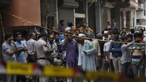 People gather around the site where a fire broke out in a multi-storey building in Okhla’s Zakir Nagar in the early hours of Tuesday, August 6, 2019.(Burhaan Kinu/HT PHOTO) People gather around the site where a fire broke out in a multi-storey building in Okhla’s Zakir Nagar in the early hours of Tuesday, August 6, 2019.(Burhaan Kinu/HT PHOTO)