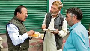 National Security Advisor Ajit Doval interacts with locals while reviewing the security situation in Shopian on Wednesday.(PTI Photo) National Security Advisor Ajit Doval interacts with locals while reviewing the security situation in Shopian on Wednesday.(PTI Photo)
