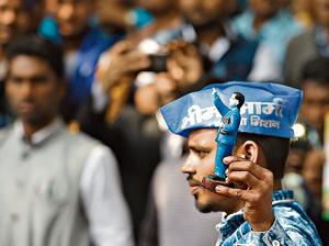 A Bhim Army supporter holds up an Ambedkar figure at a rally celebrating political leader Kanshi Ram’s 85th birthday on March 15, 2019.(Raj K Raj/HT PHOTO) A Bhim Army supporter holds up an Ambedkar figure at a rally celebrating political leader Kanshi Ram’s 85th birthday on March 15, 2019.(Raj K Raj/HT PHOTO)