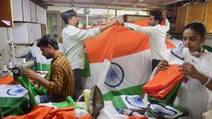 Workers prepare Indian flags at a workshop ahead of Independence Day, in Mumbai on Friday.(Photo: PTI)
