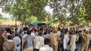 Villagers gather at the site where atleast 9 people were gunned down over a property dispute on July 18, 2019.(PTI) Villagers gather at the site where atleast 9 people were gunned down over a property dispute on July 18, 2019.(PTI)
