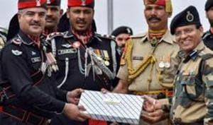 Uncertainty prevailed over exchange of sweets between Border Security Force (BSF) and Pakistan Rangers at Attari-Wagah border on the occasion of Eid-al-Adah on Monday.(PTI photo) Uncertainty prevailed over exchange of sweets between Border Security Force (BSF) and Pakistan Rangers at Attari-Wagah border on the occasion of Eid-al-Adah on Monday.(PTI photo)