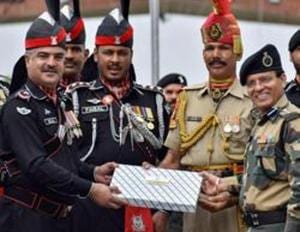 Uncertainty prevailed over exchange of sweets between Border Security Force (BSF) and Pakistan Rangers at Attari-Wagah border on the occasion of Eid-al-Adah on Monday.(PTI photo) Uncertainty prevailed over exchange of sweets between Border Security Force (BSF) and Pakistan Rangers at Attari-Wagah border on the occasion of Eid-al-Adah on Monday.(PTI photo)