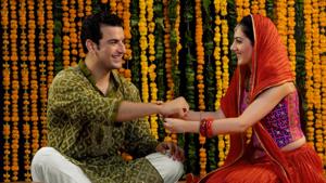 On Raksha Bandhan, sisters tie rakhis around the wrist of the brother, signifying their affection towards him, and apply tilak on their forehead.(Shutterstock)