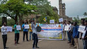 Students performed a street play outside Savitribai Phule Pune University’s main building to highlight the issues they were facing on campus, on Tuesday.(Milind Saurkar/HT Photo) Students performed a street play outside Savitribai Phule Pune University’s main building to highlight the issues they were facing on campus, on Tuesday.(Milind Saurkar/HT Photo)