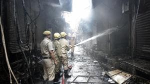 Six shops were damaged after a fire broke out in the Gandhinagar garments market in East Delhi on Tuesday morning, said the fire department.(Sonu Mehta/HT PHOTO) Six shops were damaged after a fire broke out in the Gandhinagar garments market in East Delhi on Tuesday morning, said the fire department.(Sonu Mehta/HT PHOTO)