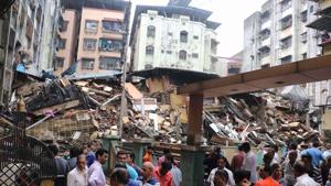 A day after Mahak Apartment in Ulhasnagar collapsed, 75 families living in the vicinity vacated their homes on Wednesday, amid panic created by rumours of another building crash. (Photo by Rishikesh Choudhary/ Hindustan Times) A day after Mahak Apartment in Ulhasnagar collapsed, 75 families living in the vicinity vacated their homes on Wednesday, amid panic created by rumours of another building crash. (Photo by Rishikesh Choudhary/ Hindustan Times)