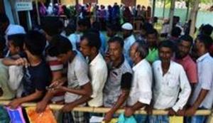 People wait in queue to check their names on the draft list at the National Register of Citizens (NRC) centre at a village in Nagaon district, Assam state, India, July 30, 2018.(REUTERS) People wait in queue to check their names on the draft list at the National Register of Citizens (NRC) centre at a village in Nagaon district, Assam state, India, July 30, 2018.(REUTERS)