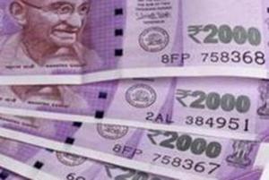 The rupee opened on a weak note and fell 20 paise to 71.47 against the US dollar in early trade on Friday amid rising crude oil prices and cautious opening in domestic equities.(Sonu Mehta/HT PHOTO) The rupee opened on a weak note and fell 20 paise to 71.47 against the US dollar in early trade on Friday amid rising crude oil prices and cautious opening in domestic equities.(Sonu Mehta/HT PHOTO)
