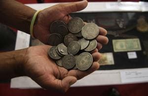Old coins at the Munshi Aziz Bhat Museum of Central Asian And Kargil Trade Artifacts. Several communities across India are now setting up their own small community museums to display their historical heritage because they believe that is the best way to preserve their own history and culture for their next generation, and also provide a local context of the artefacts for those who come from outside.(Waseem Andrabi/HT Photo) Old coins at the Munshi Aziz Bhat Museum of Central Asian And Kargil Trade Artifacts. Several communities across India are now setting up their own small community museums to display their historical heritage because they believe that is the best way to preserve their own history and culture for their next generation, and also provide a local context of the artefacts for those who come from outside.(Waseem Andrabi/HT Photo)