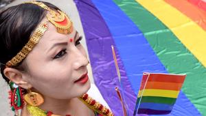 A member of the Lesbian, Gay, Bisexual and Transgender (LGBT) community looks on while taking part in a Pride Parade in Kathmandu.(Prakash Mathena/AFP)