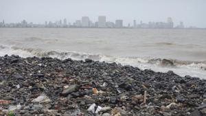 Huge amounts of unidentified rocky debris was found along the isolated stretches of Girgaum Chowpatty.(HT photo) Huge amounts of unidentified rocky debris was found along the isolated stretches of Girgaum Chowpatty.(HT photo)