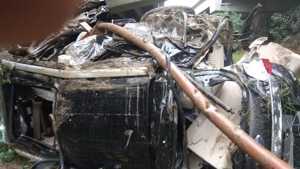 A speeding car lost balance and fell off the Yamuna Expressway near Zero Point onSunday morning(Anupam Thapa/Ht Photo) A speeding car lost balance and fell off the Yamuna Expressway near Zero Point onSunday morning(Anupam Thapa/Ht Photo)