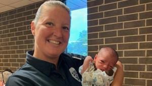 Officer Melissa Carey with the baby she saved.(Facebook/@DanvilleVAPolice) Officer Melissa Carey with the baby she saved.(Facebook/@DanvilleVAPolice)