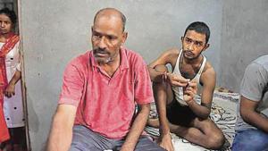 Ankit lives with his parents, a younger brother and a sister in Bambawad in Dadri. Rishipal, his father, runs a barber shop in the village.(HT image) Ankit lives with his parents, a younger brother and a sister in Bambawad in Dadri. Rishipal, his father, runs a barber shop in the village.(HT image)