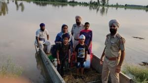 Some of those rescued at Kuttiwala village in Tarn Taran district, Punjab.(HT Photo) Some of those rescued at Kuttiwala village in Tarn Taran district, Punjab.(HT Photo)