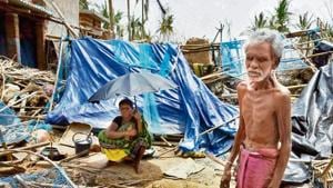 A man and a woman seen amid destruction in the aftermath of Cyclone Fani.(Arabinda Mahapatra / Hindustan Times) A man and a woman seen amid destruction in the aftermath of Cyclone Fani.(Arabinda Mahapatra / Hindustan Times)