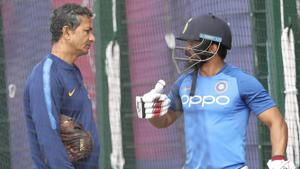 India's Kedar Jadhav, right, talks to batting coach Sanjay Bangar after batting in the nets.(AP) India's Kedar Jadhav, right, talks to batting coach Sanjay Bangar after batting in the nets.(AP)